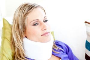 Woman in neck brace